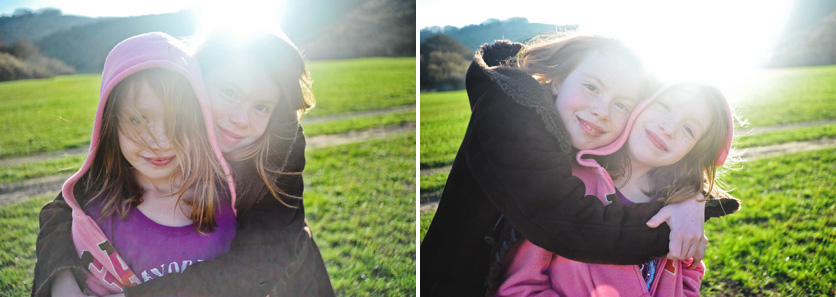 Sisters in a field on a warm winter day