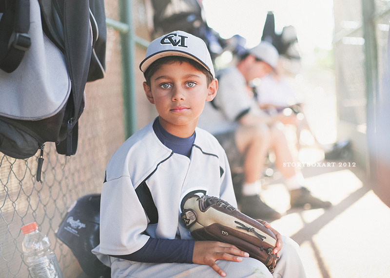 Kid in dugout